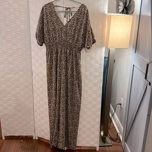 Floral print, lightweight jumpsuit with ruched waist and tie back